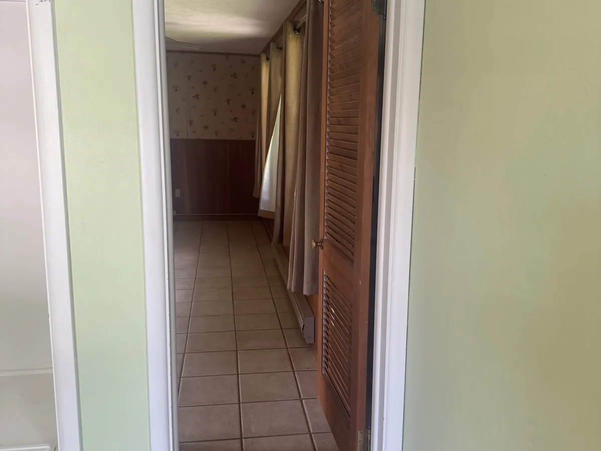 Hallway off the entry before renovation
