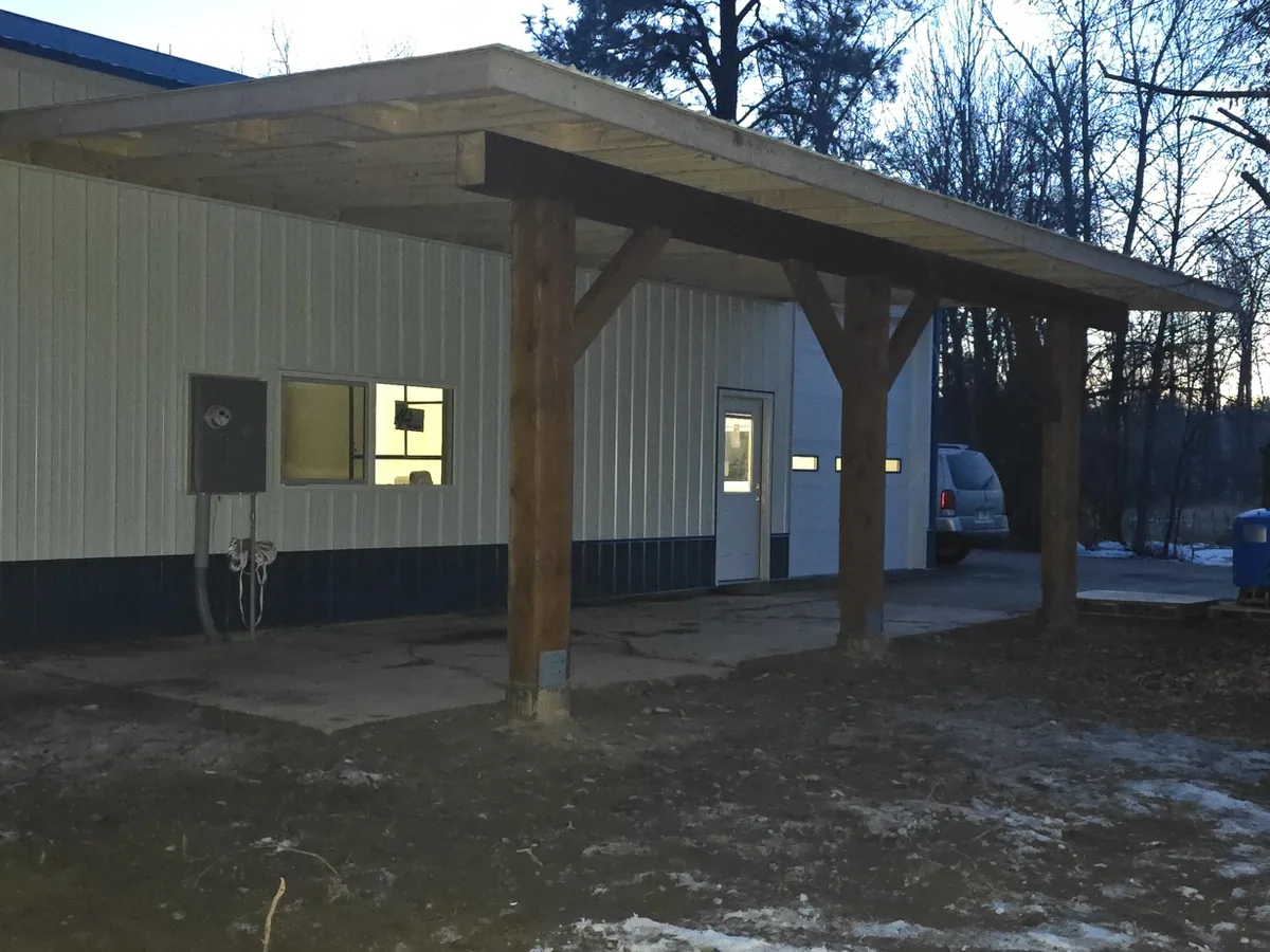 A heavy timber post-and-beam covered porch we built on a home outside Missoula